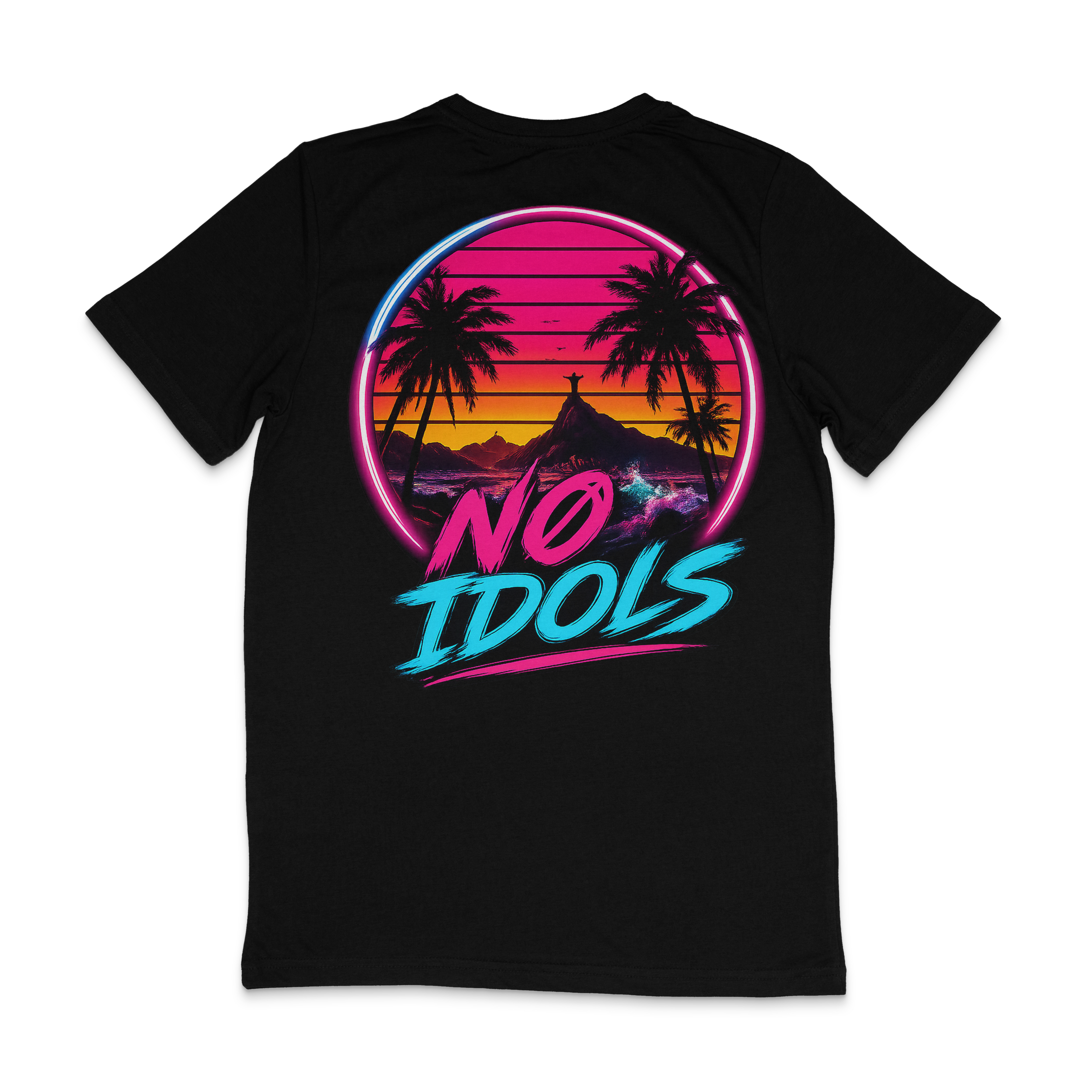 A black short-sleeve t-shirt with a retro 80s-style graphic on the front. The graphic features a circular sunset scene with palm trees, a mountain, and a surfer, with the text 'NO IDOLS' written in pink and blue stylized lettering.