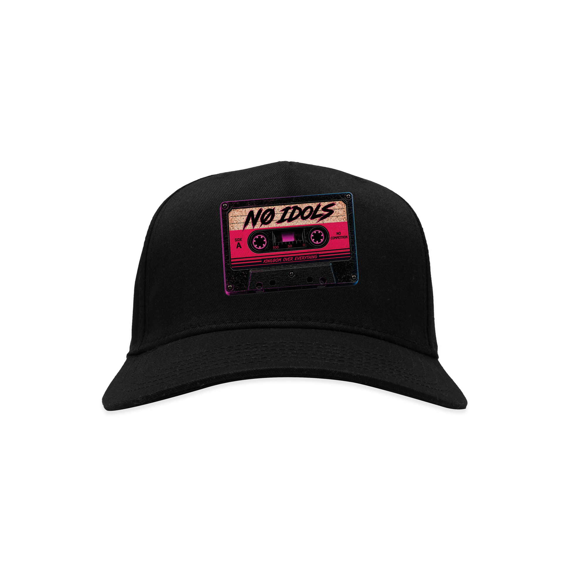 A black baseball cap featuring a rectangular patch on the front with a retro cassette tape graphic in pink, beige, and black, with the text 'NO IDOLS' written across it.