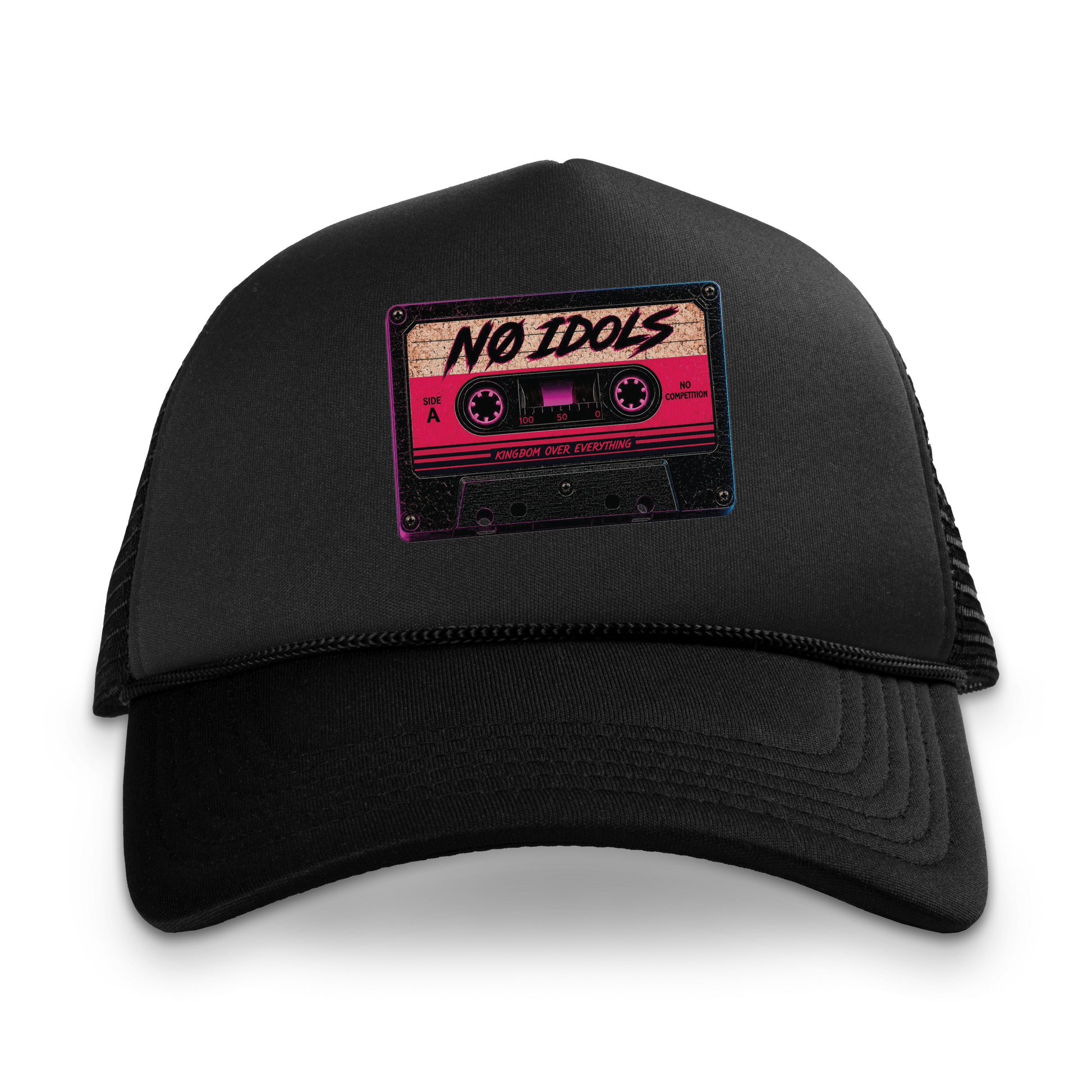 A black trucker hat with a pink and black cassette tape patch on the front that reads 'NO IDOLS'.