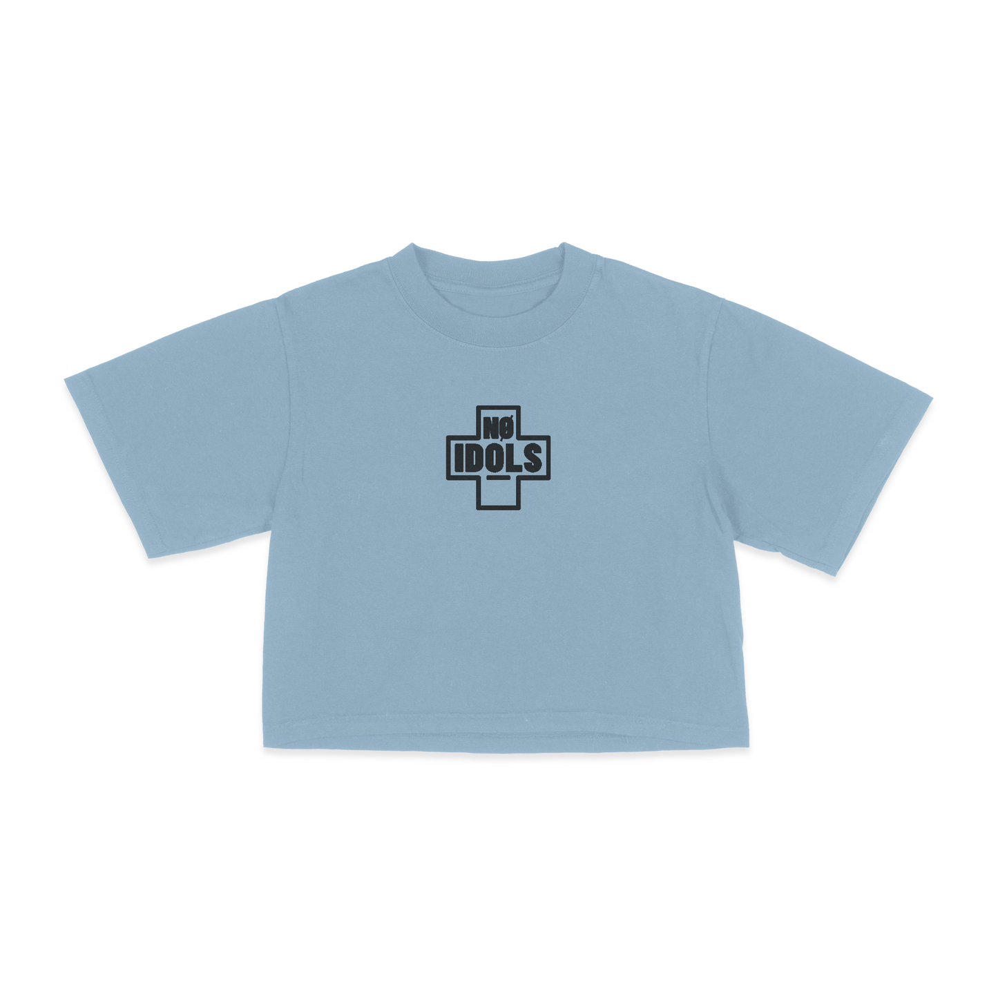 A light blue short-sleeve crop top t-shirt with a black and white graphic on the chest featuring a cross and the text 'NO IDOLS'.