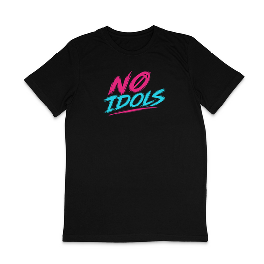 A black short-sleeve crewneck t-shirt featuring a vibrant graphic on the chest that reads 'NO IDOLS' in stylized pink and cyan lettering, displayed against a solid white background.